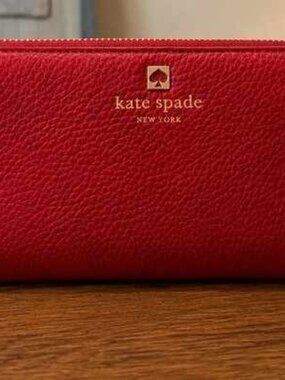 kate spade red leather zip wallet with gold logo
